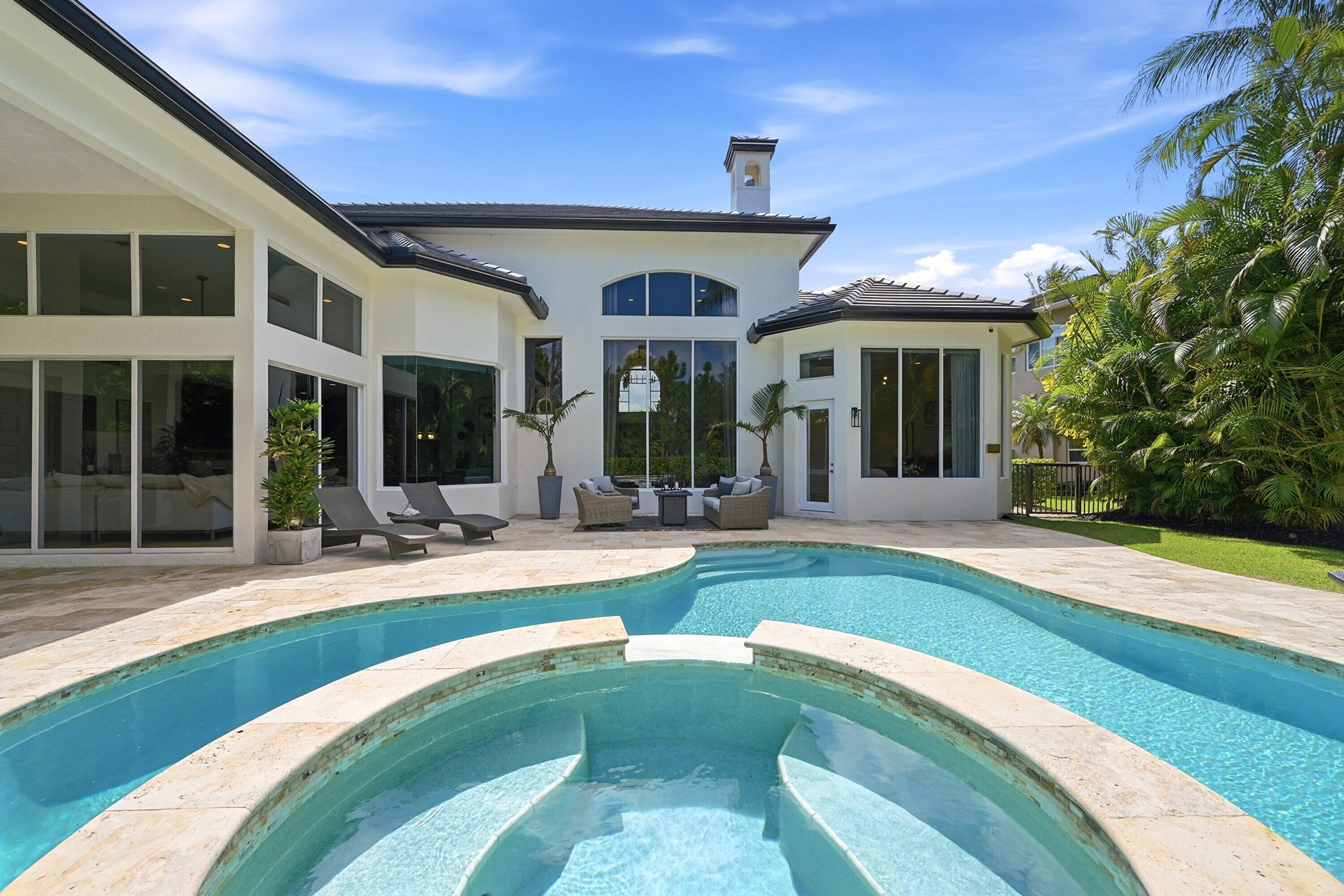 2399 Northwest 49th Lane Boca Raton, FL 33431 - Photo 62 of 75 a view of a house with sitting area and yard