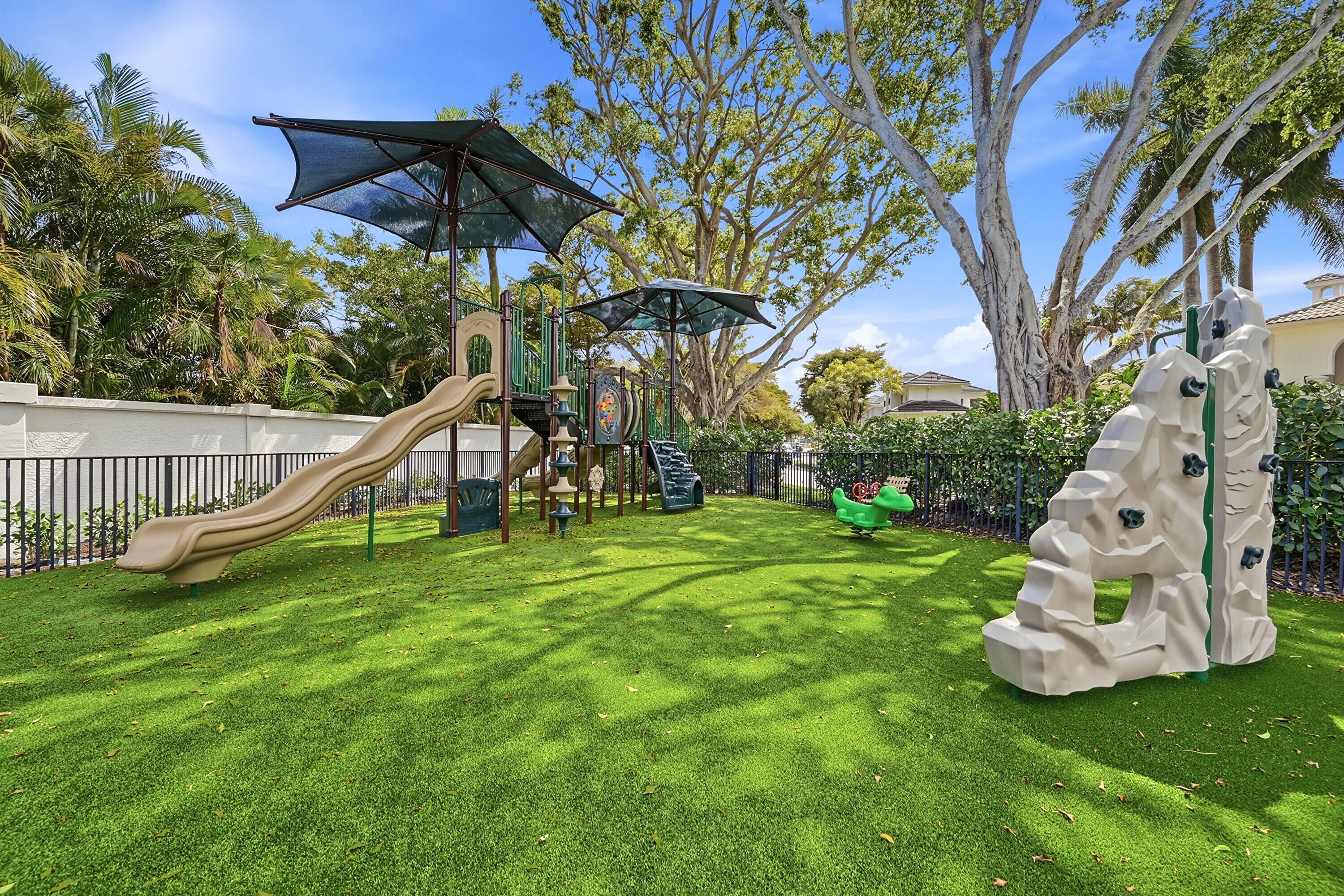 2399 Northwest 49th Lane Boca Raton, FL 33431 - Photo 69 of 75 a view of a garden with a slide