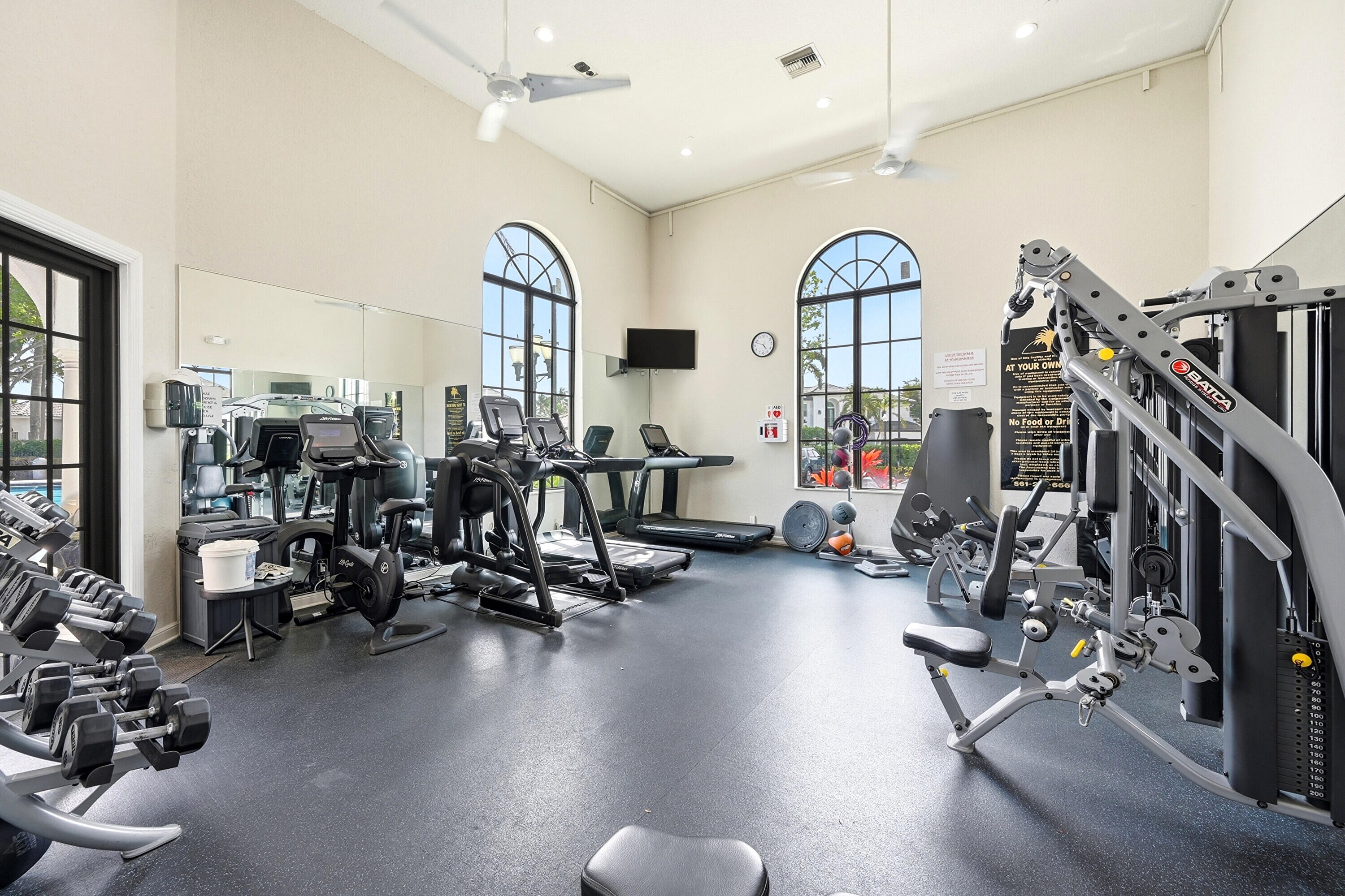 2399 Northwest 49th Lane Boca Raton, FL 33431 - Photo 73 of 75 a view of a room with gym equipment
