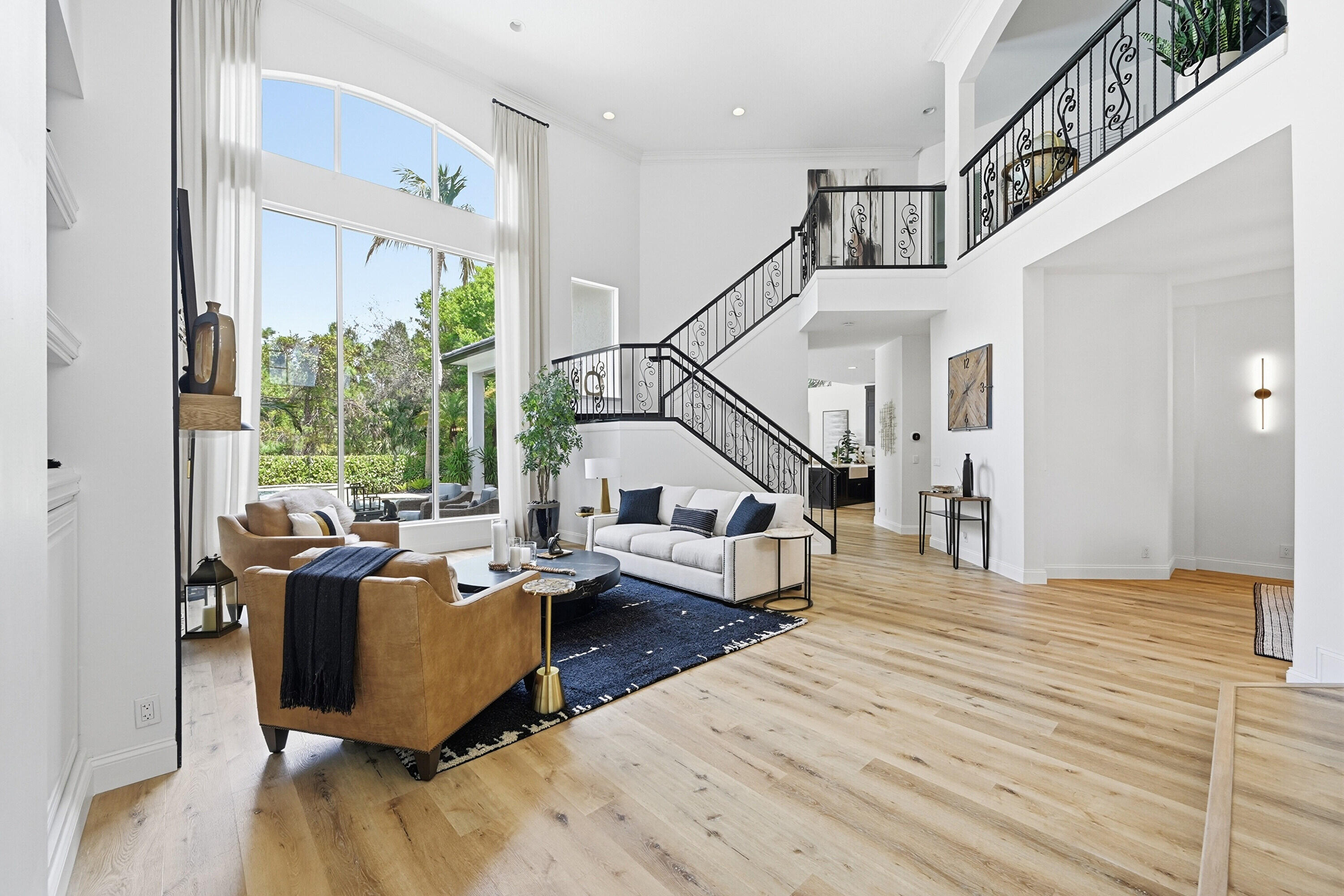 2399 Northwest 49th Lane Boca Raton, FL 33431 - Photo 10 of 75 a living room with furniture and wooden floor