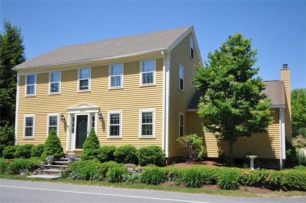 200 Still River Road Harvard, MA 01451 - Photo 1 of 28 a front view of a house with trees