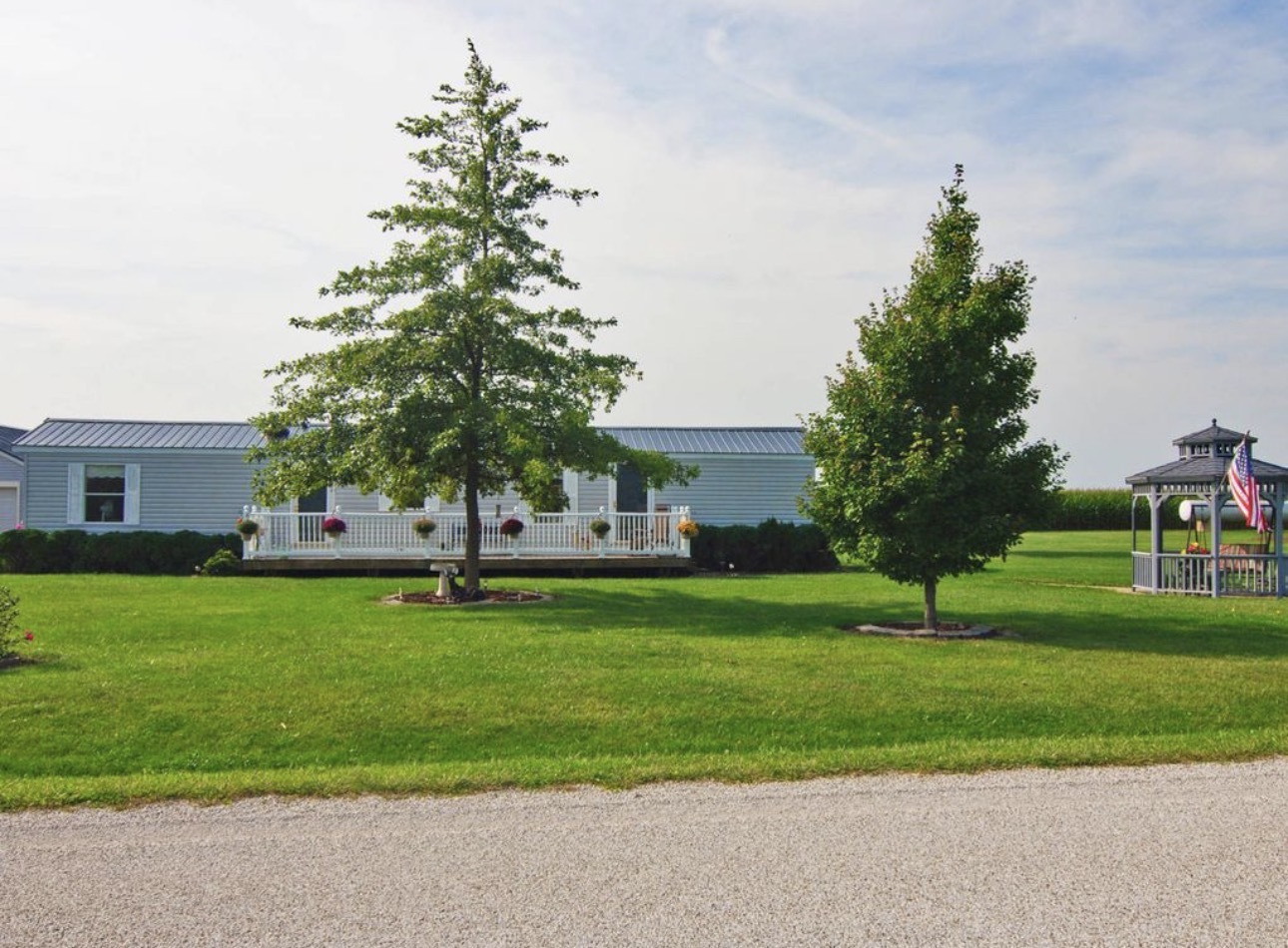 33850 East 2900 N Road Dwight, IL 60420 - Photo 15 of 16 a front view of a house with a yard and trees