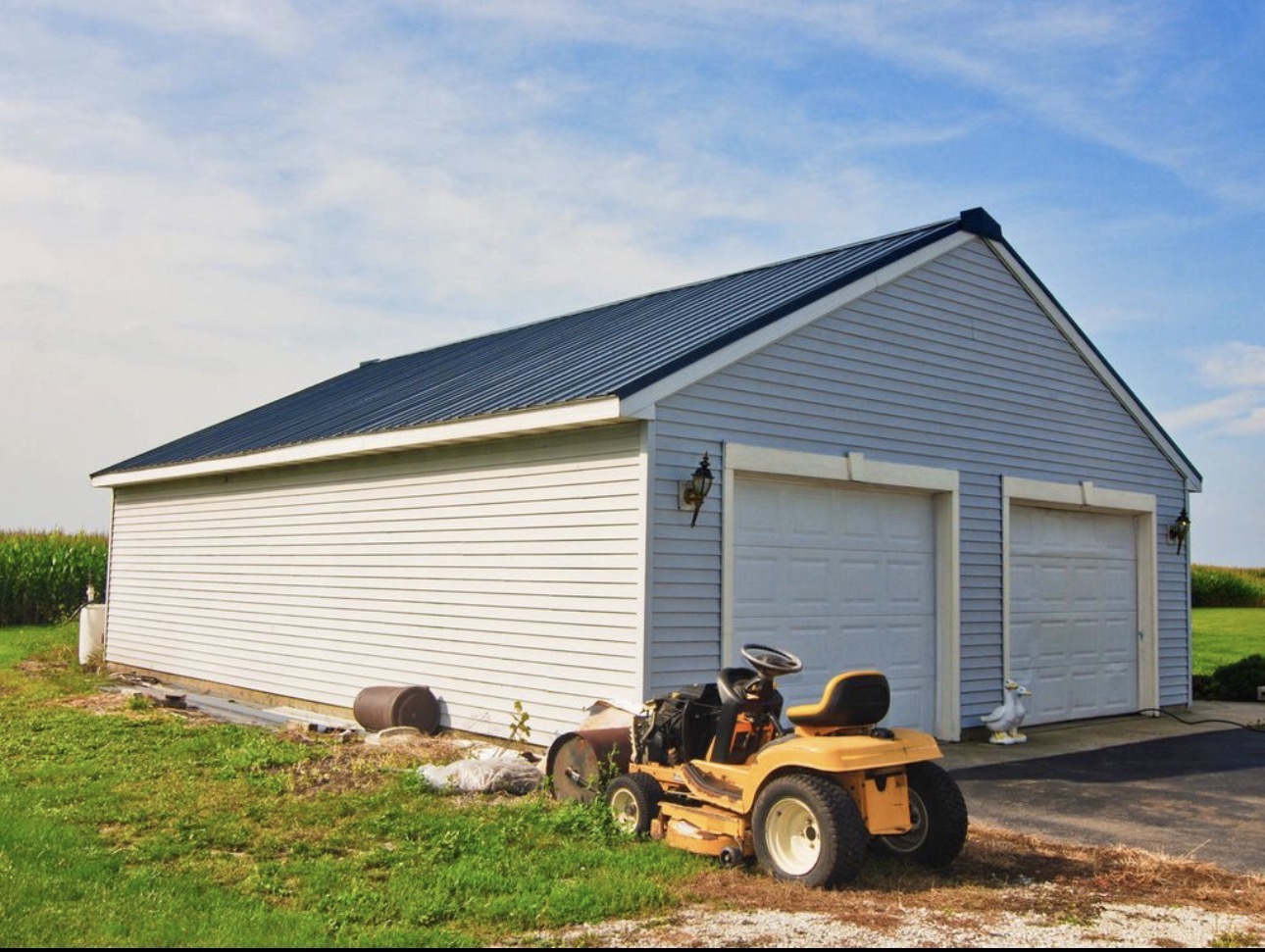 33850 East 2900 N Road Dwight, IL 60420 - Photo 2 of 16 a car parked in front of white house