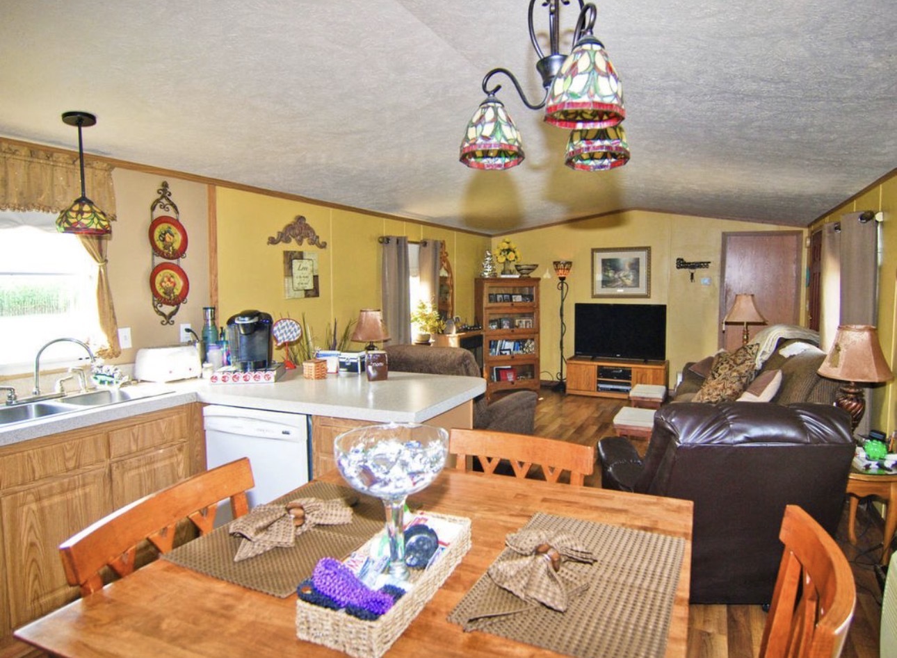 33850 East 2900 N Road Dwight, IL 60420 - Photo 6 of 16 a living room with furniture and a flat screen tv