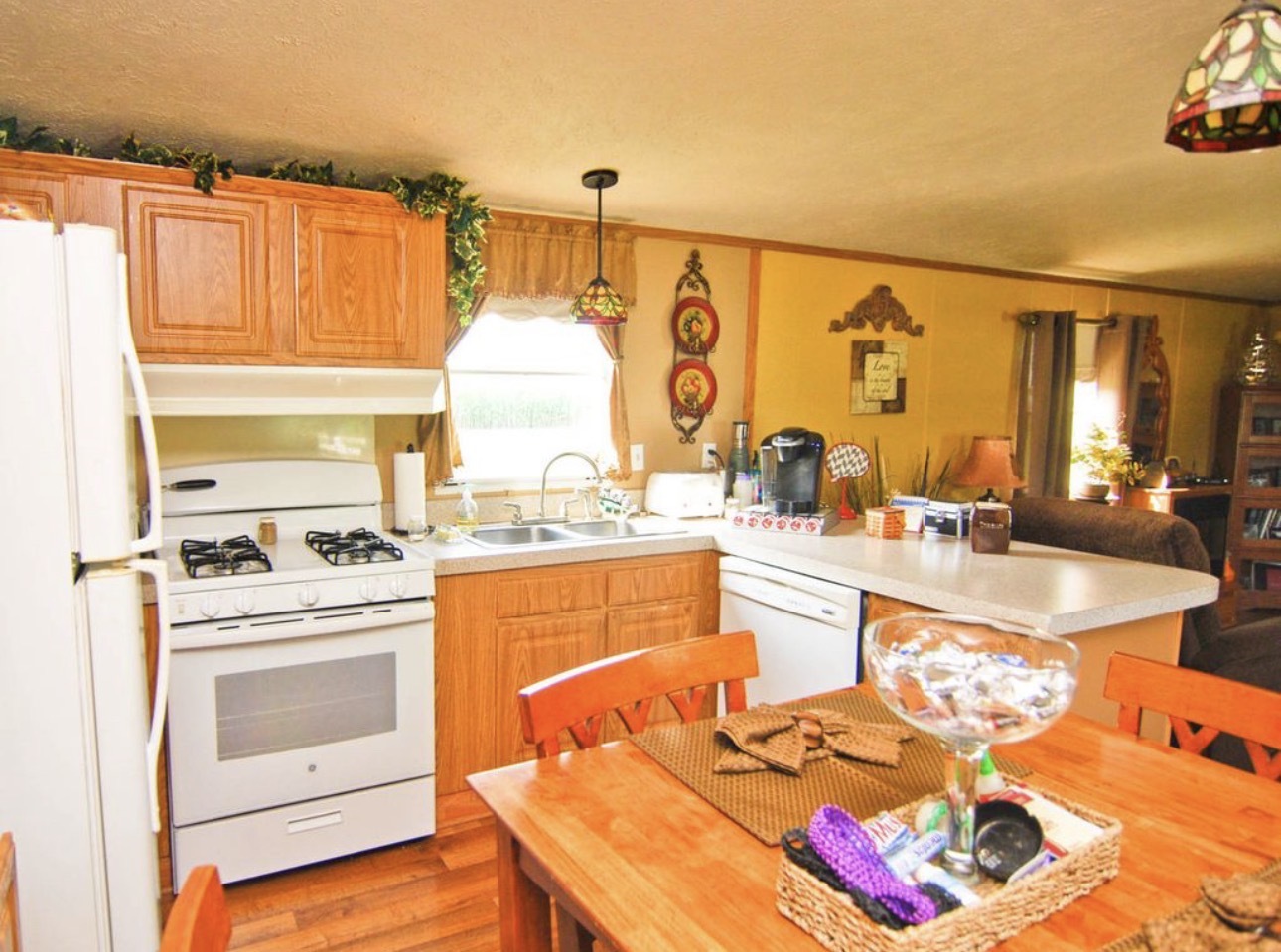 33850 East 2900 N Road Dwight, IL 60420 - Photo 7 of 16 a kitchen with a stove a sink and cabinets