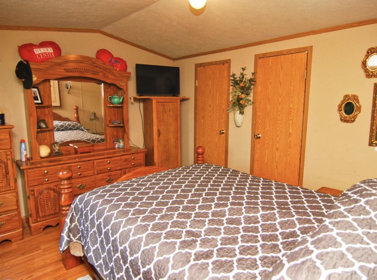 33850 East 2900 N Road Dwight, IL 60420 - Photo 10 of 16 a bedroom with a bed and a cabinets