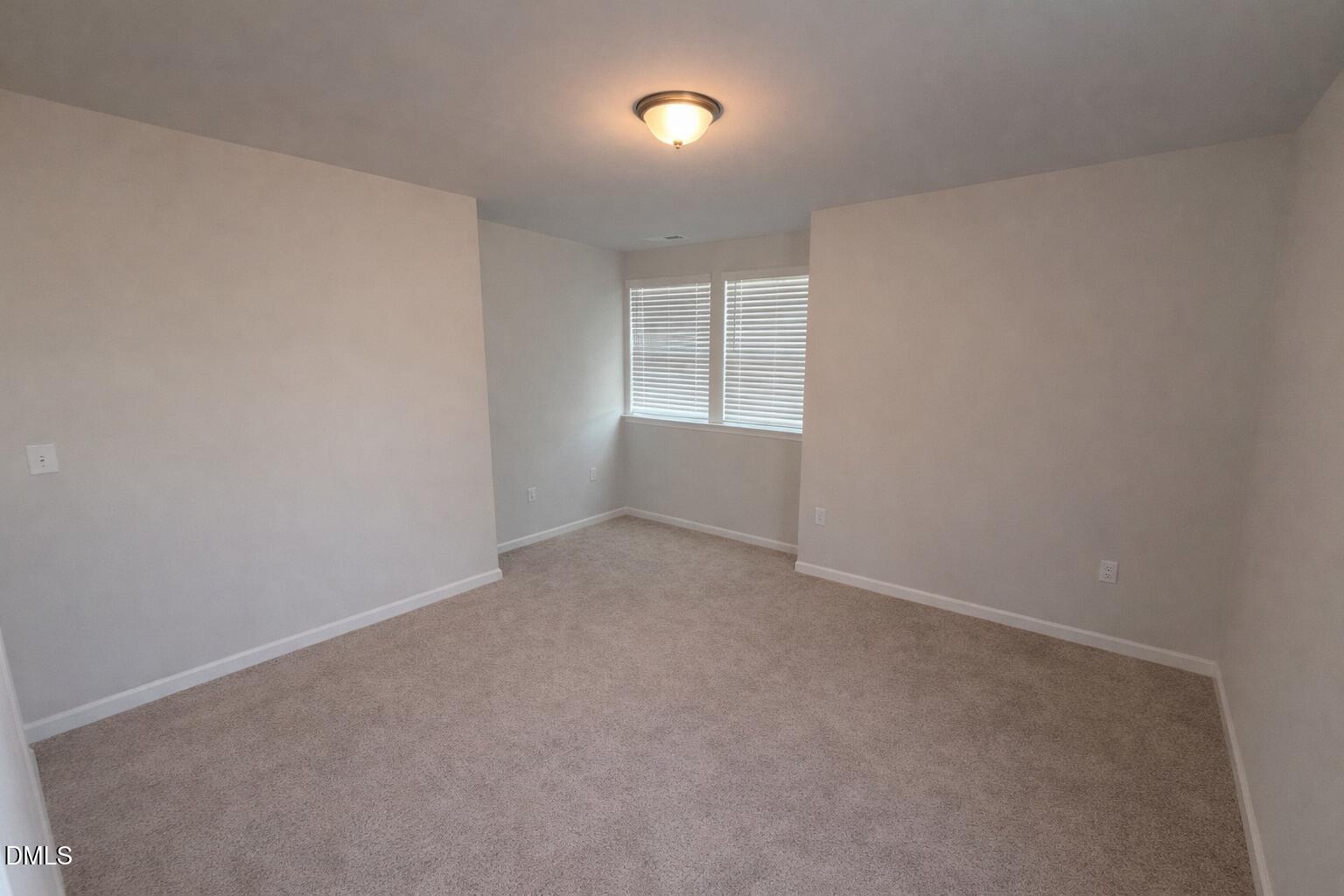 217 Beacon Hl Road Lillington, NC 27546 - Photo 15 of 24 an empty room with a window