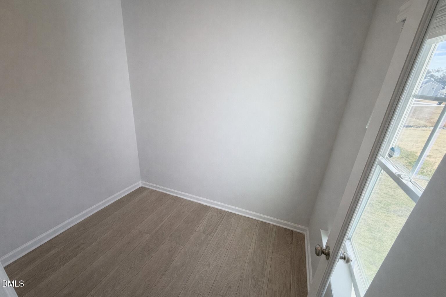 217 Beacon Hl Road Lillington, NC 27546 - Photo 17 of 24 a view of an empty room and window