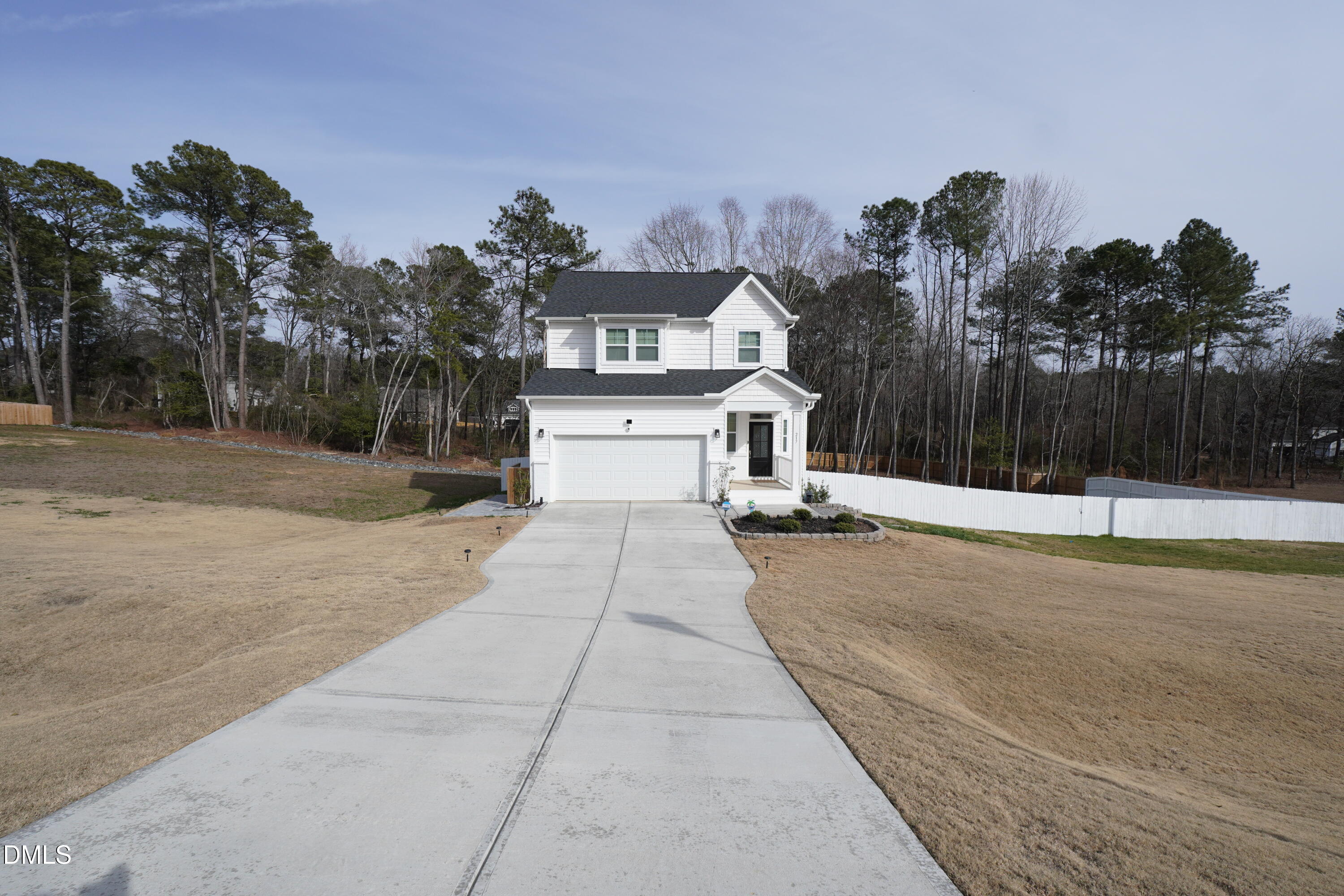 217 Beacon Hl Road Lillington, NC 27546 - Photo 2 of 24 a view of a house with a yard