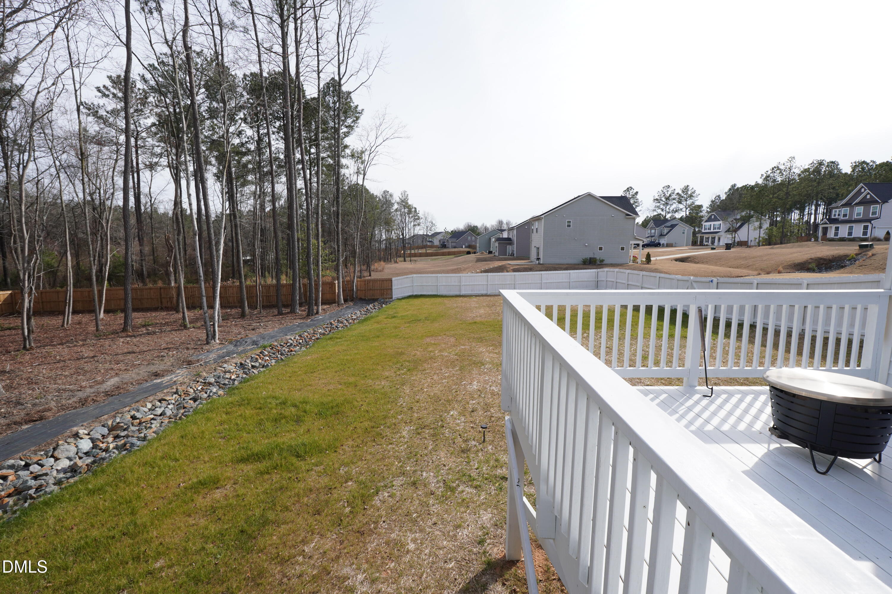 217 Beacon Hl Road Lillington, NC 27546 - Photo 22 of 24 a view of balcony with small garden