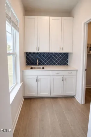 a empty closet with white paint