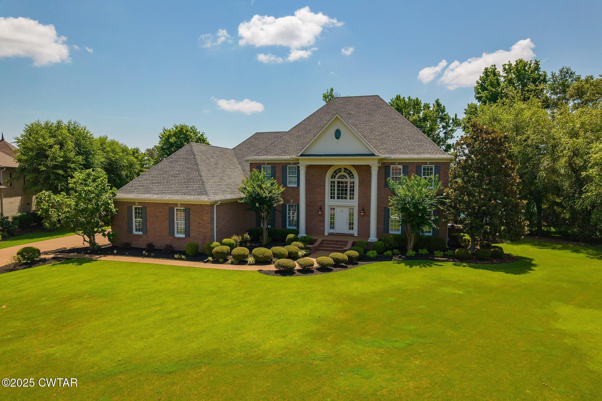 18 Admirals Pointe Jackson, TN 38305 - Photo 11 of 86 a front view of a house with garden