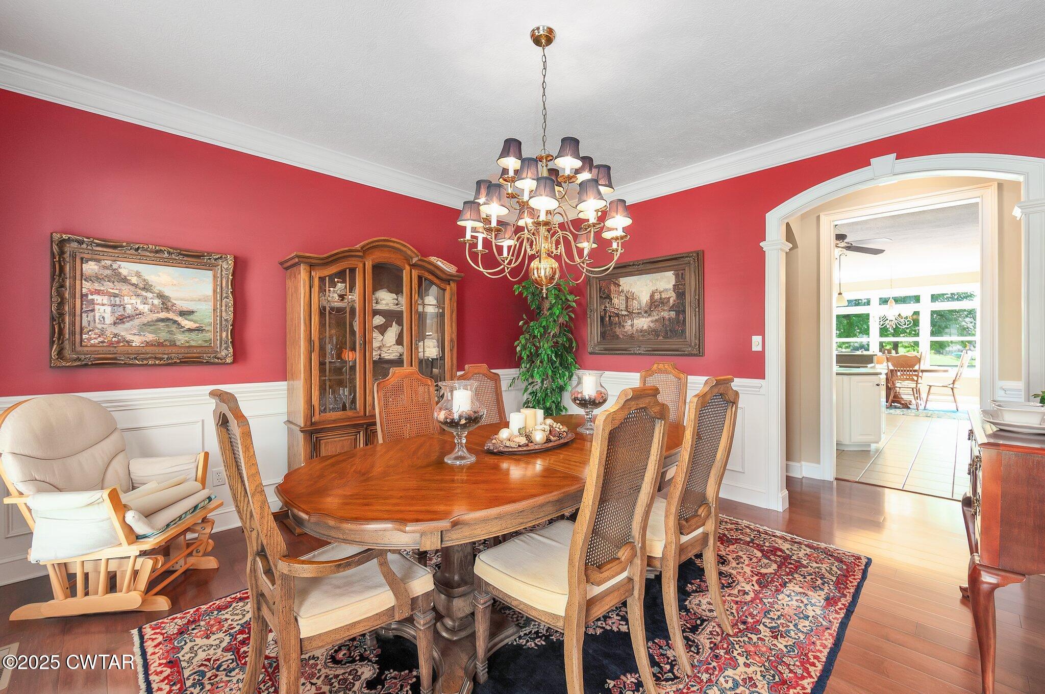 18 Admirals Pointe Jackson, TN 38305 - Photo 15 of 86 a dining room with furniture a chandelier and wooden floor