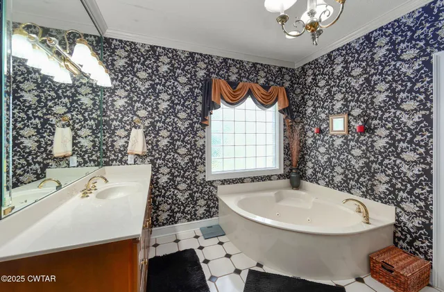 a view of a chair and table in the garden