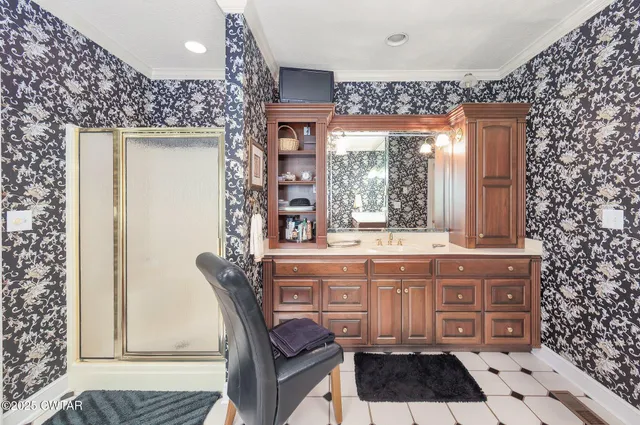 a view of a house with pool porch and chairs