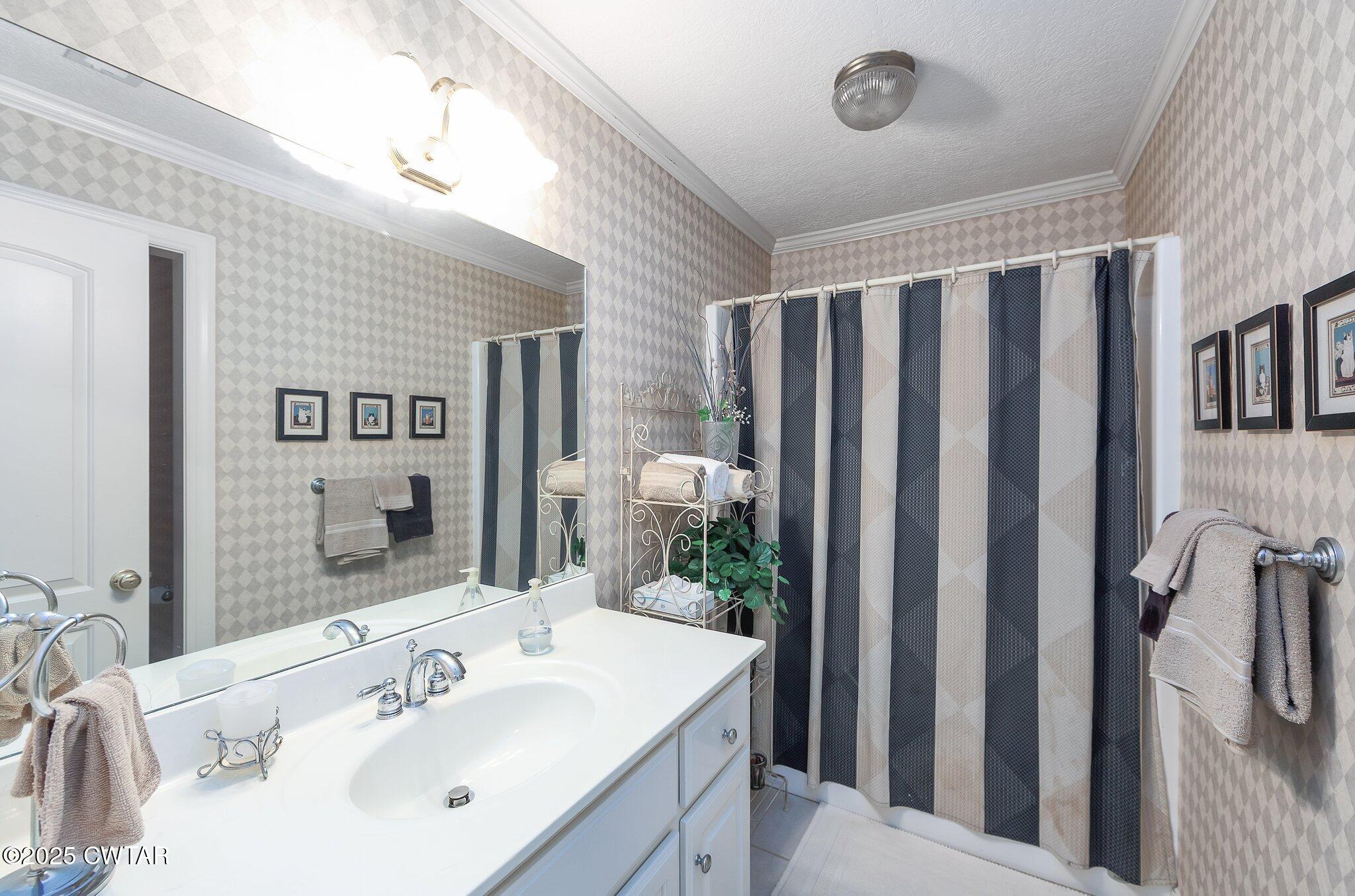 18 Admirals Pointe Jackson, TN 38305 - Photo 39 of 86 a bathroom with a sink a mirror and shower