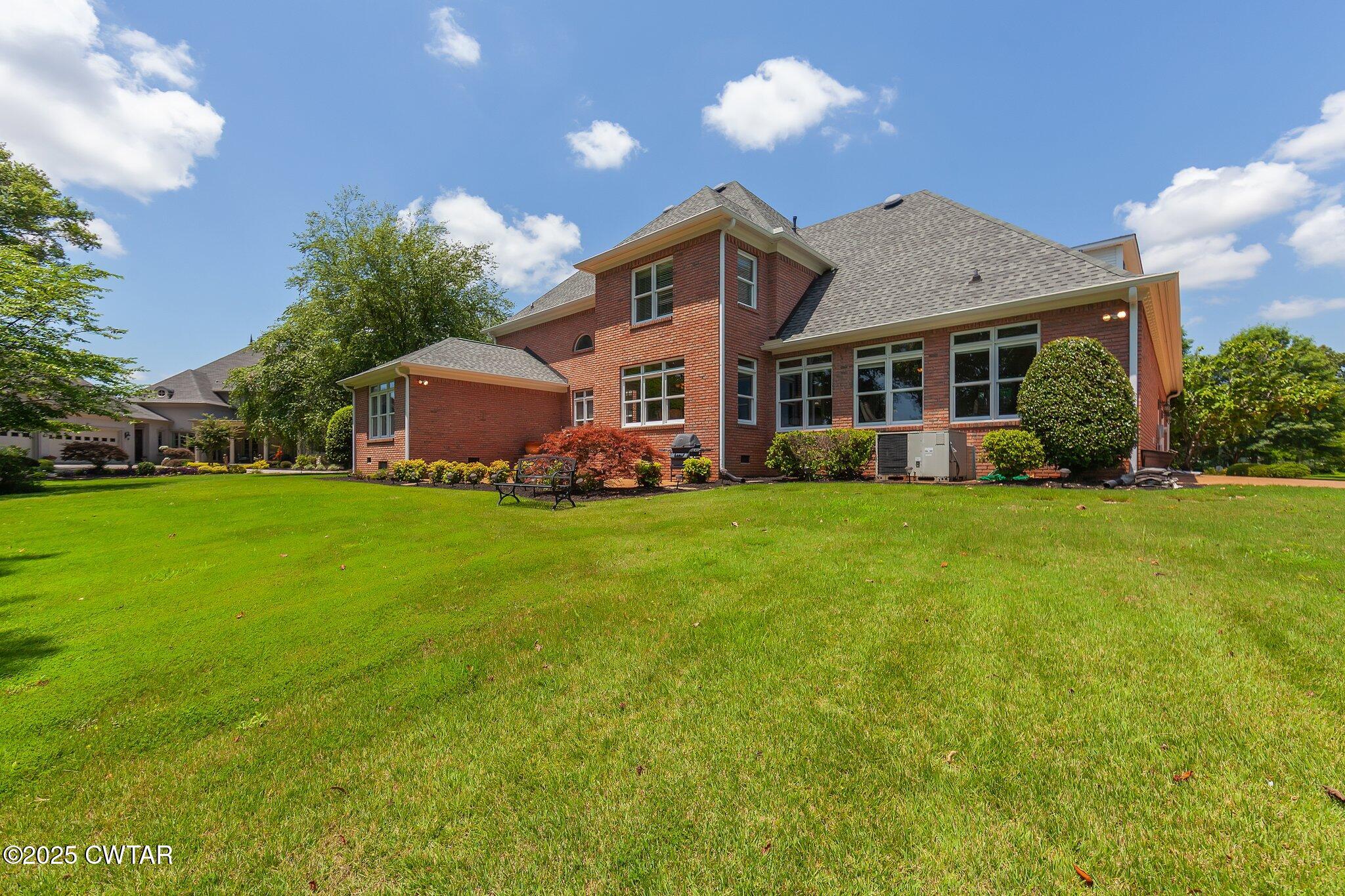 18 Admirals Pointe Jackson, TN 38305 - Photo 47 of 86 a front view of house with yard and green space