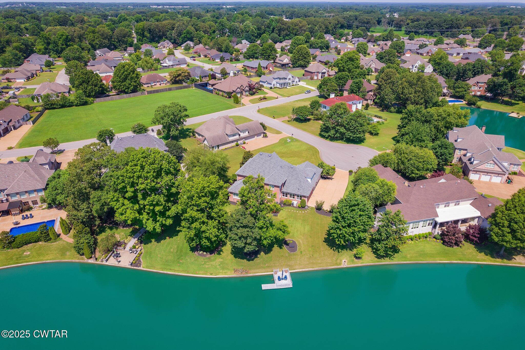 18 Admirals Pointe Jackson, TN 38305 - Photo 5 of 86 an aerial view of residential houses with outdoor space and trees