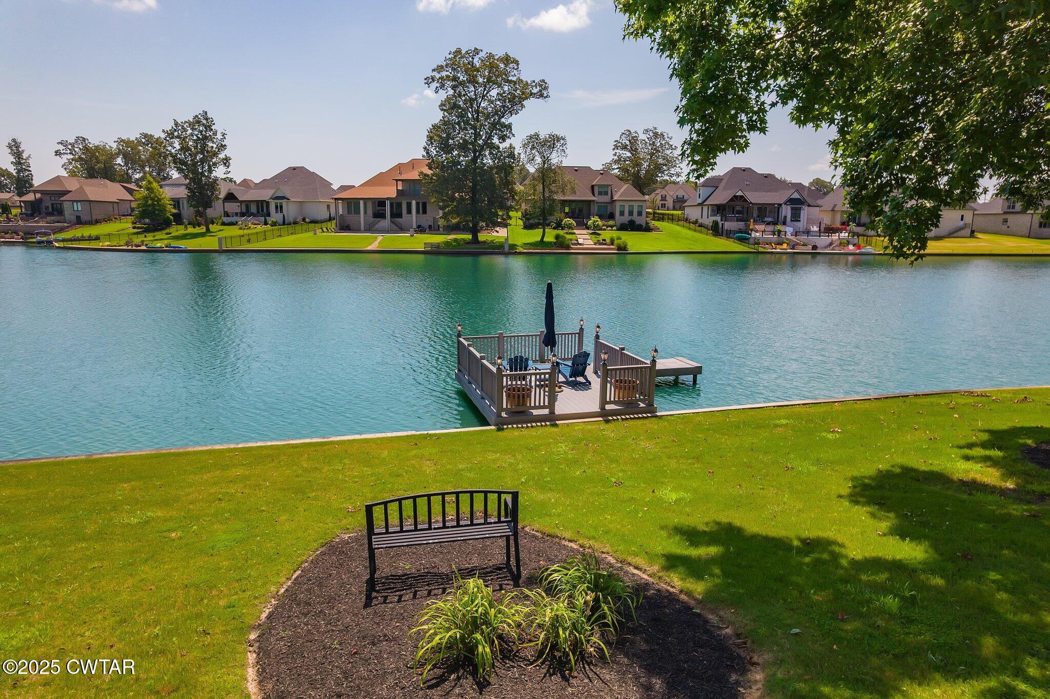 18 Admirals Pointe Jackson, TN 38305 - Photo 53 of 86 a view of a lake with a house sitting space and swimming pool