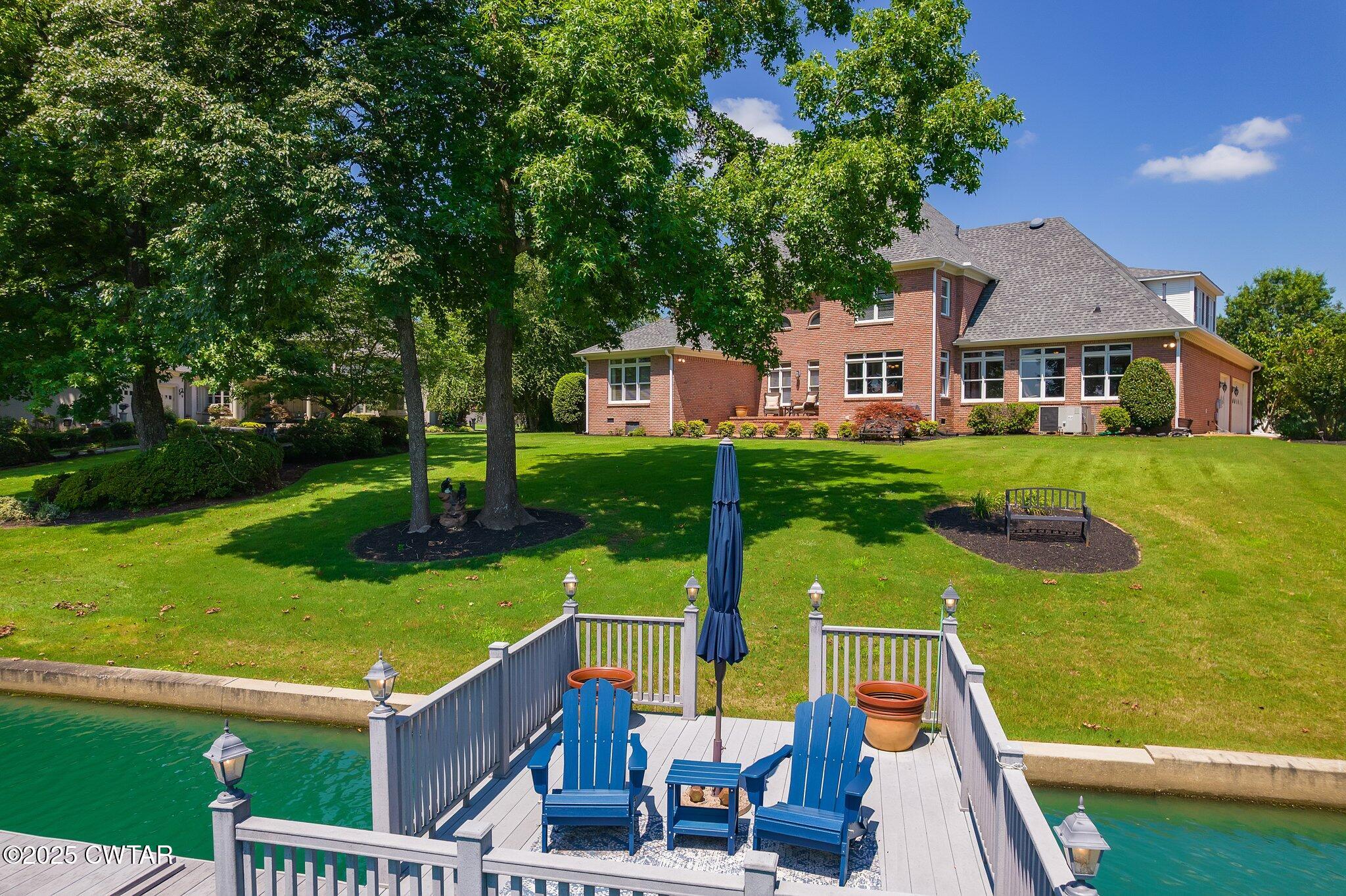 18 Admirals Pointe Jackson, TN 38305 - Photo 68 of 86 a view of a house with pool porch and chairs