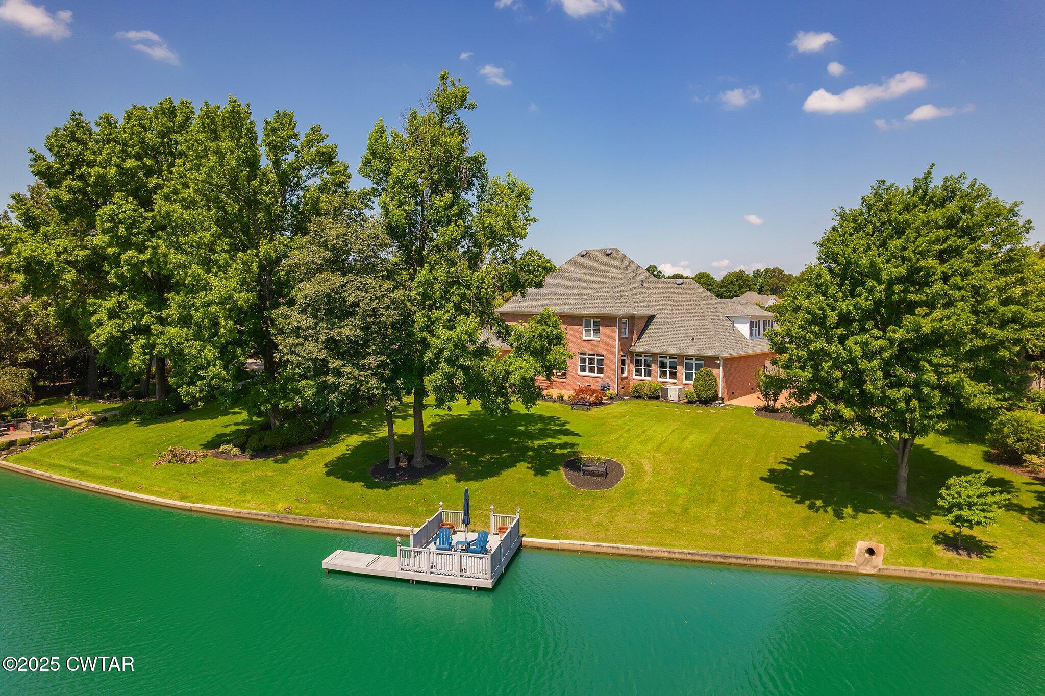 18 Admirals Pointe Jackson, TN 38305 - Photo 73 of 86 a view of a house with a yard
