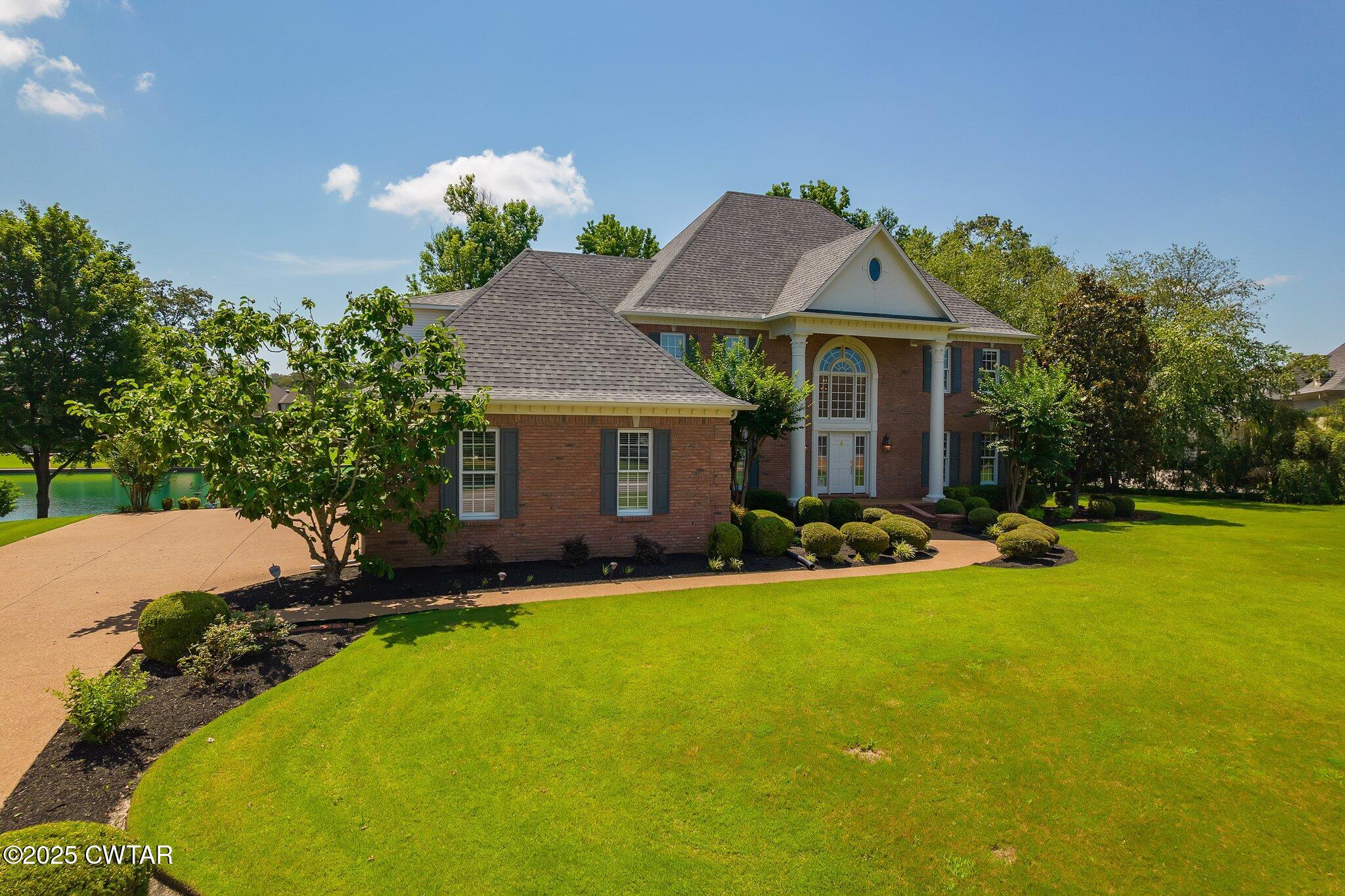 18 Admirals Pointe Jackson, TN 38305 - Photo 9 of 86 a front view of a house with swimming pool having outdoor seating