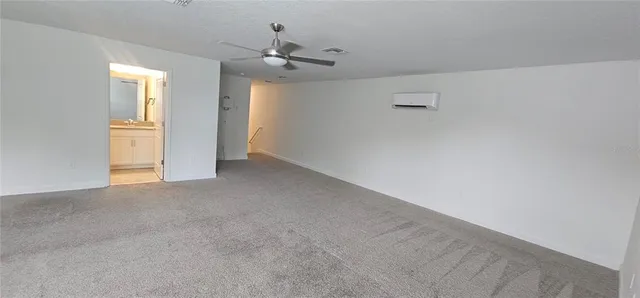 en empty room with a window