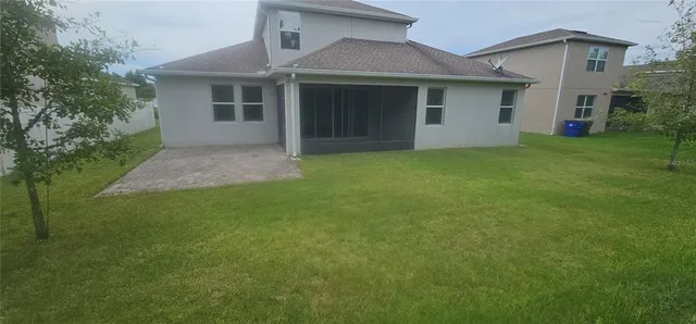 a view of a park with plants and trees