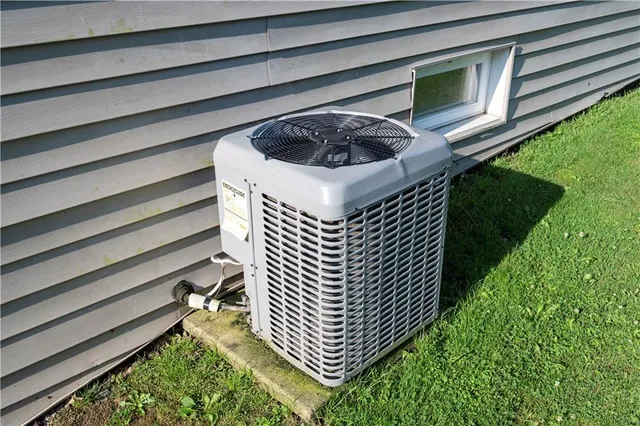 a bench sitting in front of a building