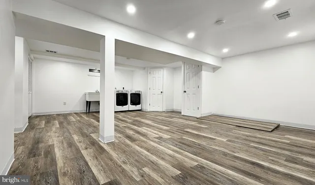 a view of a livingroom with wooden floor