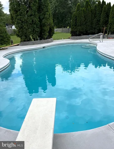 a view of a lake with a yard