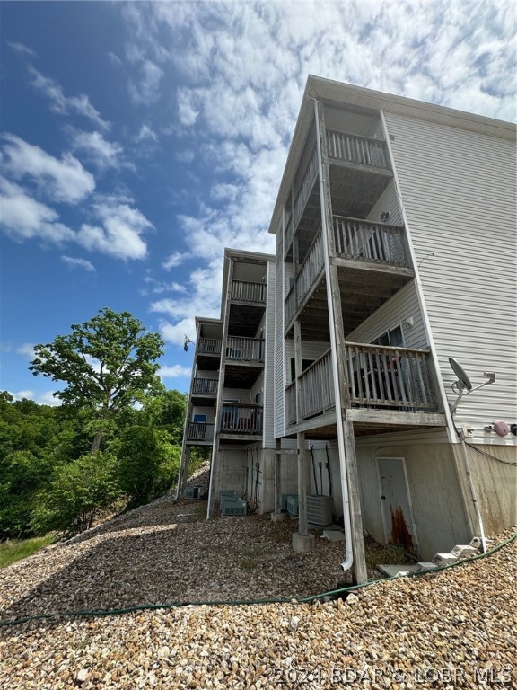 1091 Red Bud Road Osage Beach, MO 65065 - Photo 7 of 21 Backside/Decks of condos.