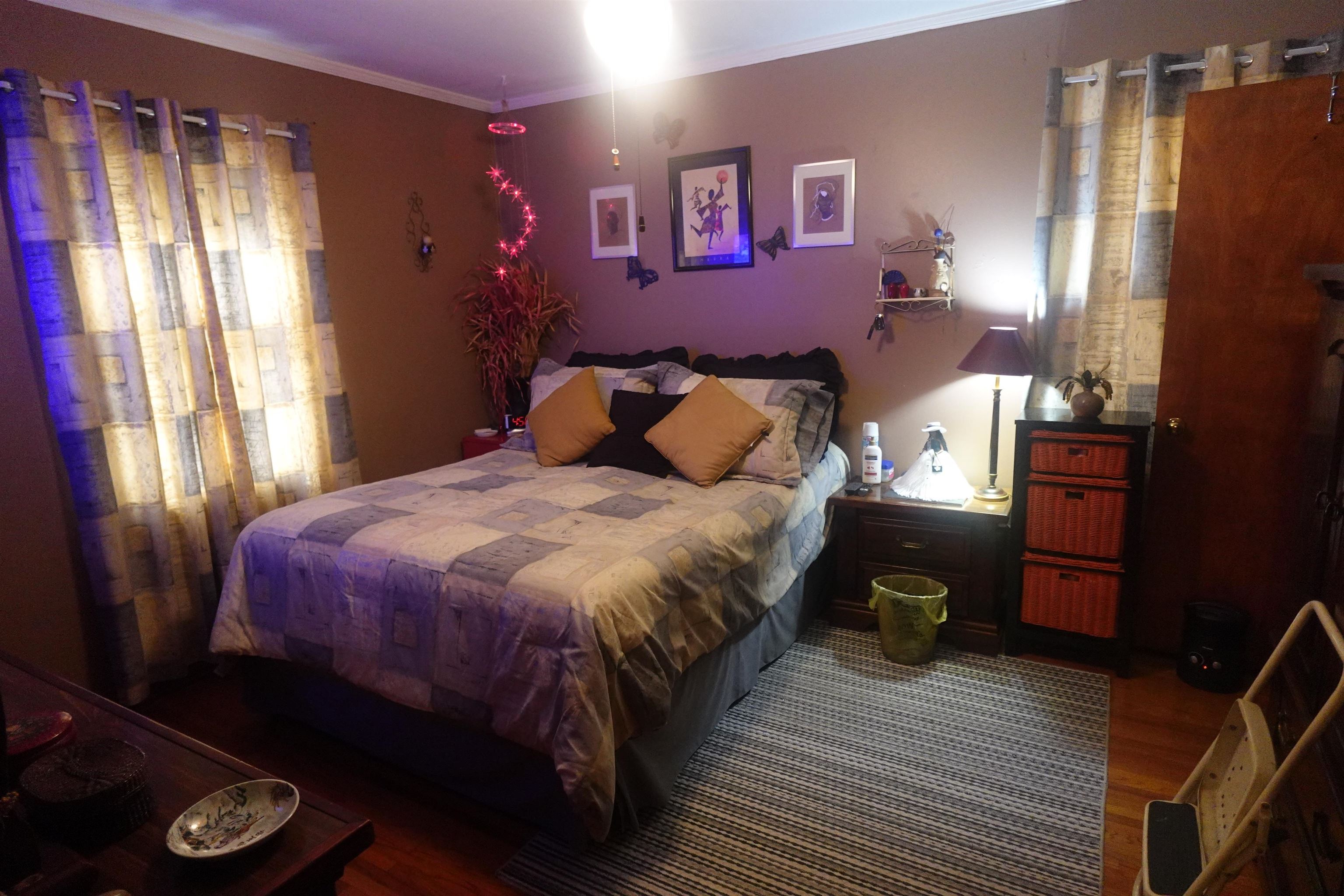 2780 James Road Memphis, TN 38127 - Photo 8 of 12 a bed sitting in a bedroom next to a window