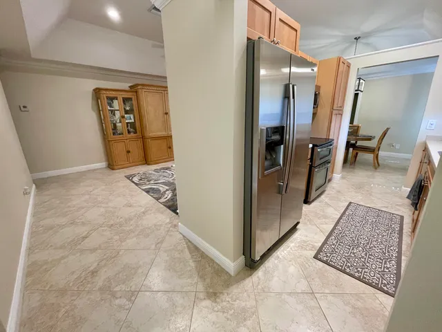 a view of hallway with furniture