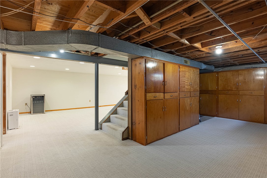 5235 West Ridgewood Road Springfield, OH 45503 - Photo 20 of 32 This spacious basement offers a versatile layout with ample storage solutions and easy access.
