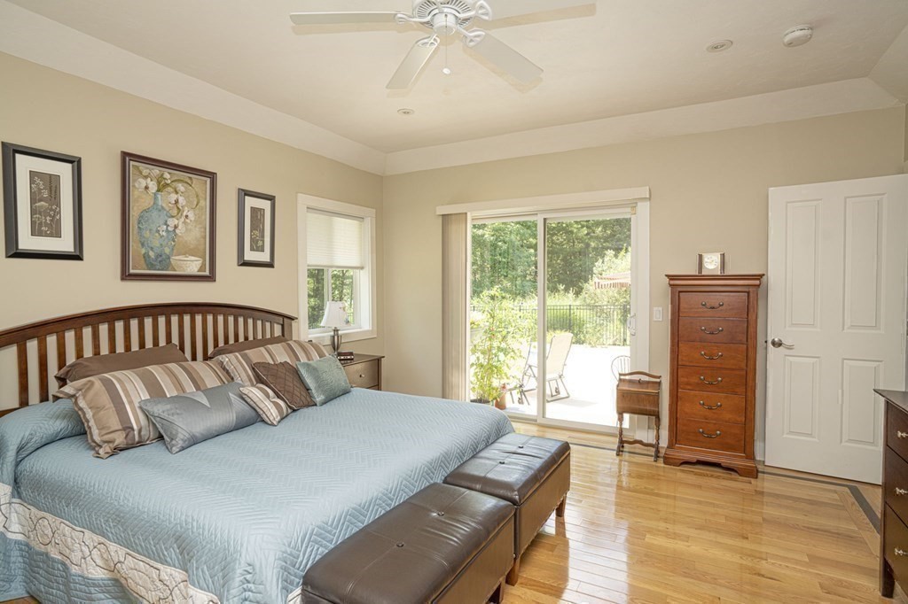 52 Upland Drive Middleboro, MA 02346 - Photo 12 of 40 a bed sitting in a bedroom next to a window