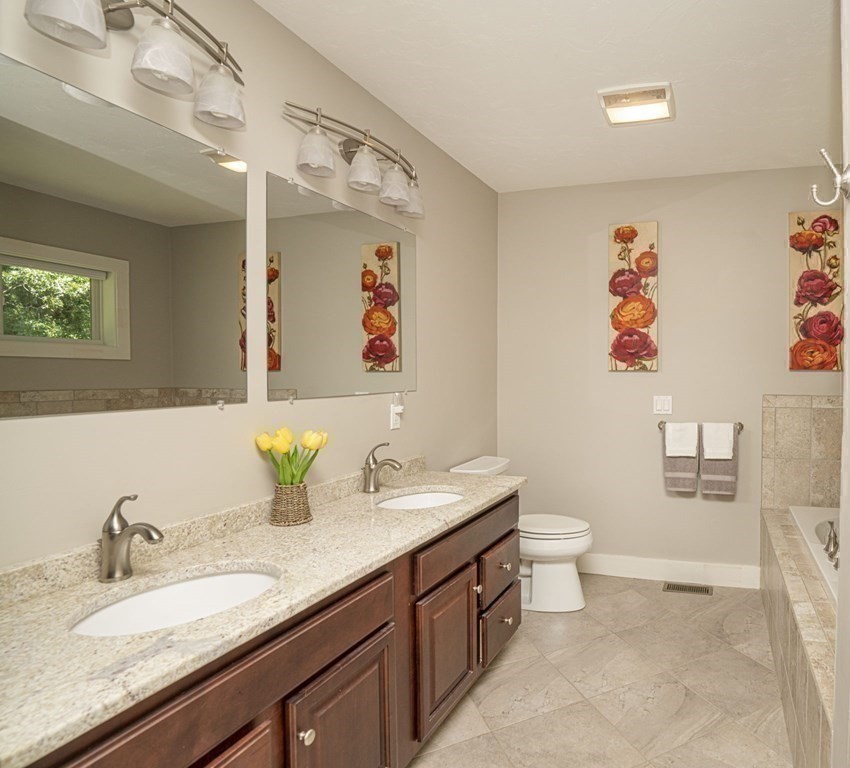 52 Upland Drive Middleboro, MA 02346 - Photo 14 of 40 a bathroom with a granite countertop sink mirror and toilet
