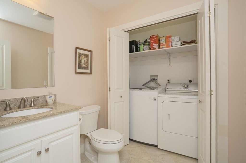 52 Upland Drive Middleboro, MA 02346 - Photo 18 of 40 a bathroom with a granite countertop sink vanity mirror and toilet
