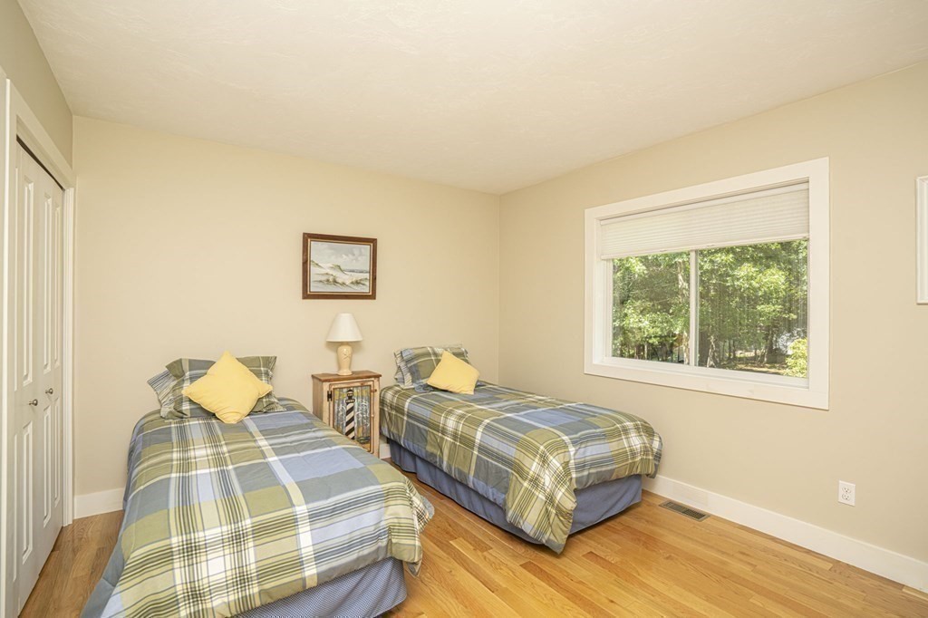 52 Upland Drive Middleboro, MA 02346 - Photo 26 of 40 a bedroom with two beds and a window