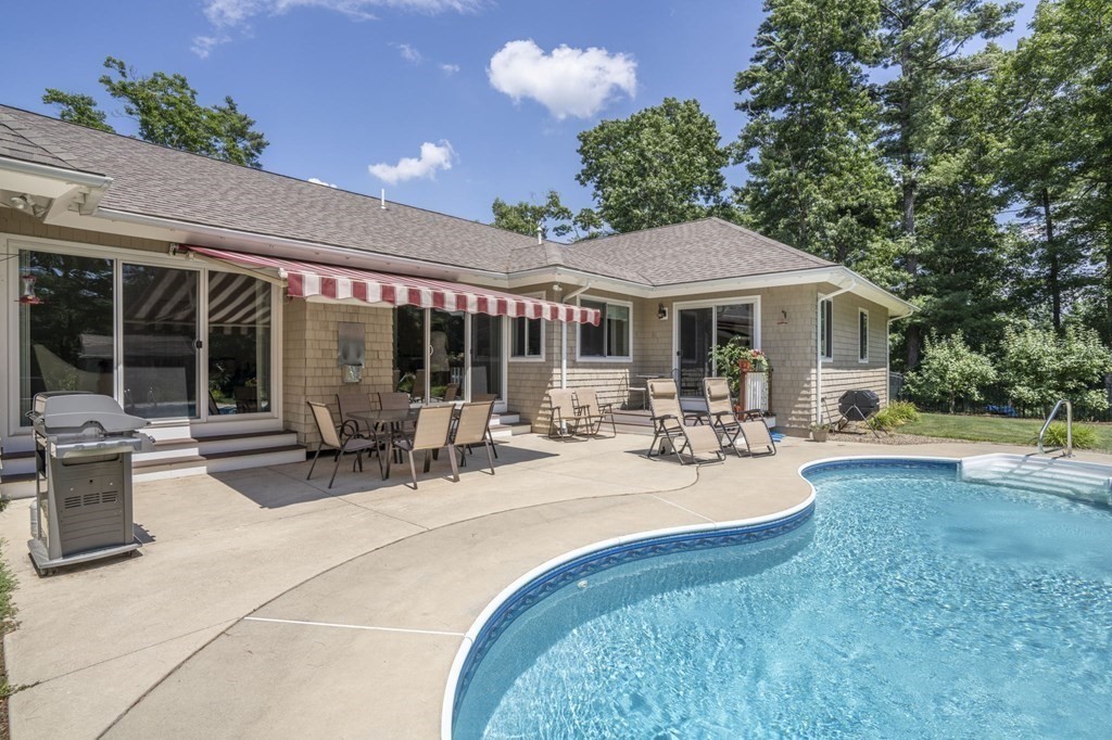 52 Upland Drive Middleboro, MA 02346 - Photo 27 of 40 a view of a house with swimming pool and sitting area