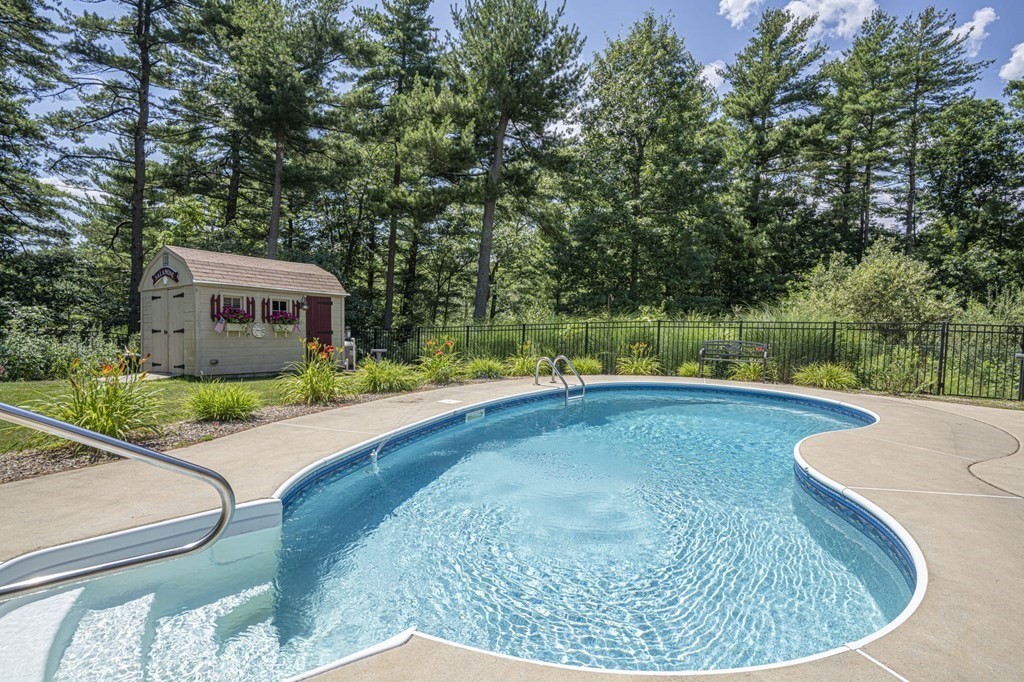 52 Upland Drive Middleboro, MA 02346 - Photo 30 of 40 a view of a swimming pool with a patio