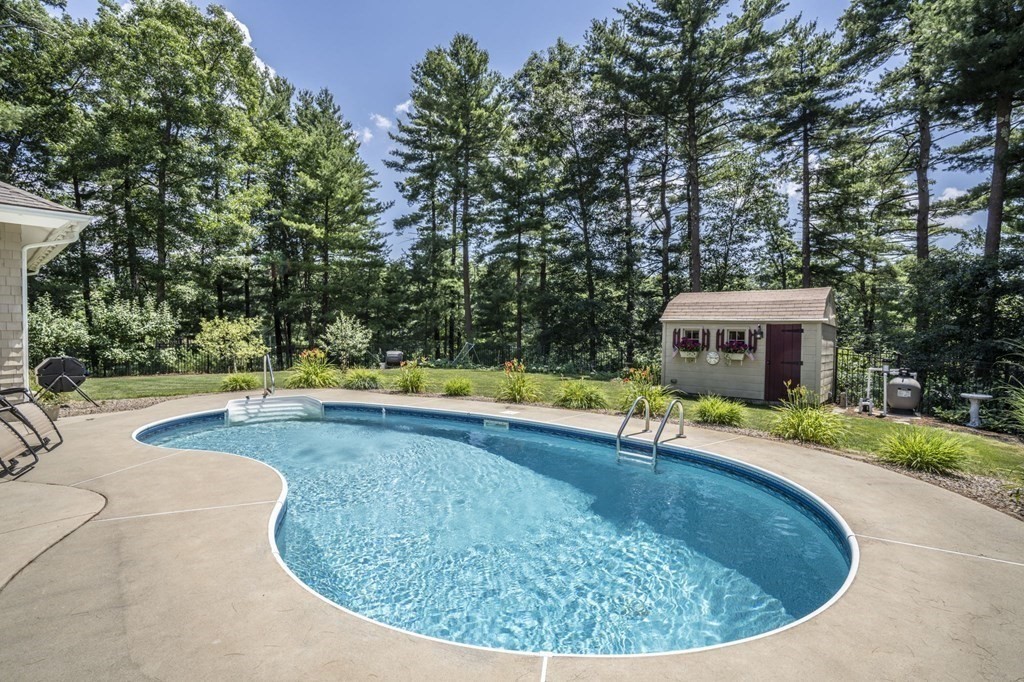 52 Upland Drive Middleboro, MA 02346 - Photo 31 of 40 a view of a swimming pool with a yard