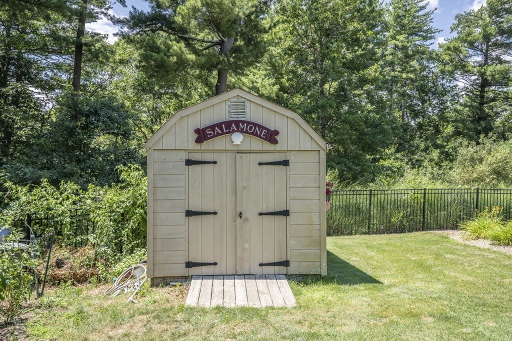 52 Upland Drive Middleboro, MA 02346 - Photo 32 of 40 a front view of a house with garden