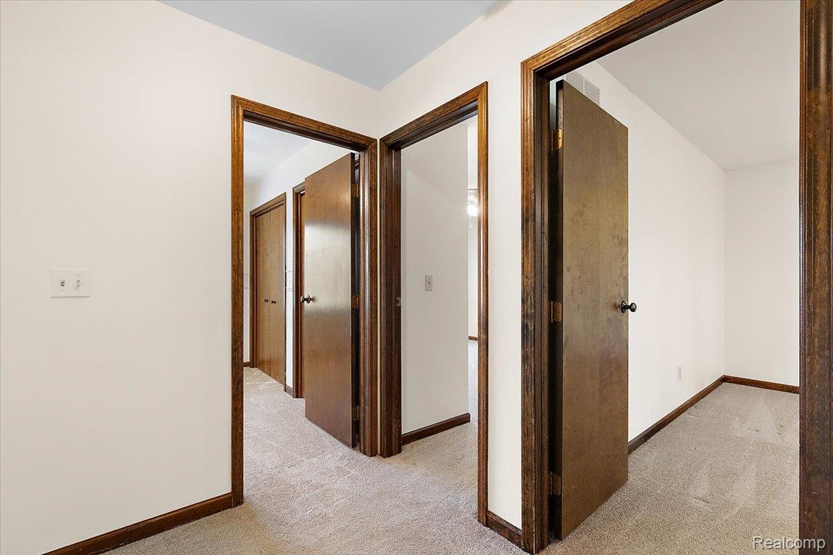 1081 Eagle Nest Drive Rochester, MI 48306 - Photo 32 of 67 Alternate View 2nd Floor Hallway