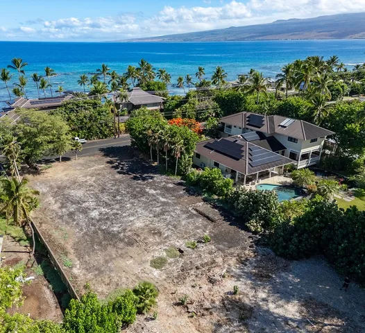 a view of a garden with an ocean