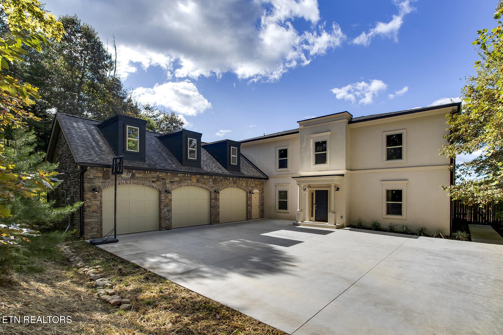 405 Beard Valley Road Maynardville, TN 37807 - Photo 1 of 60 a front view of a house with a yard and garage