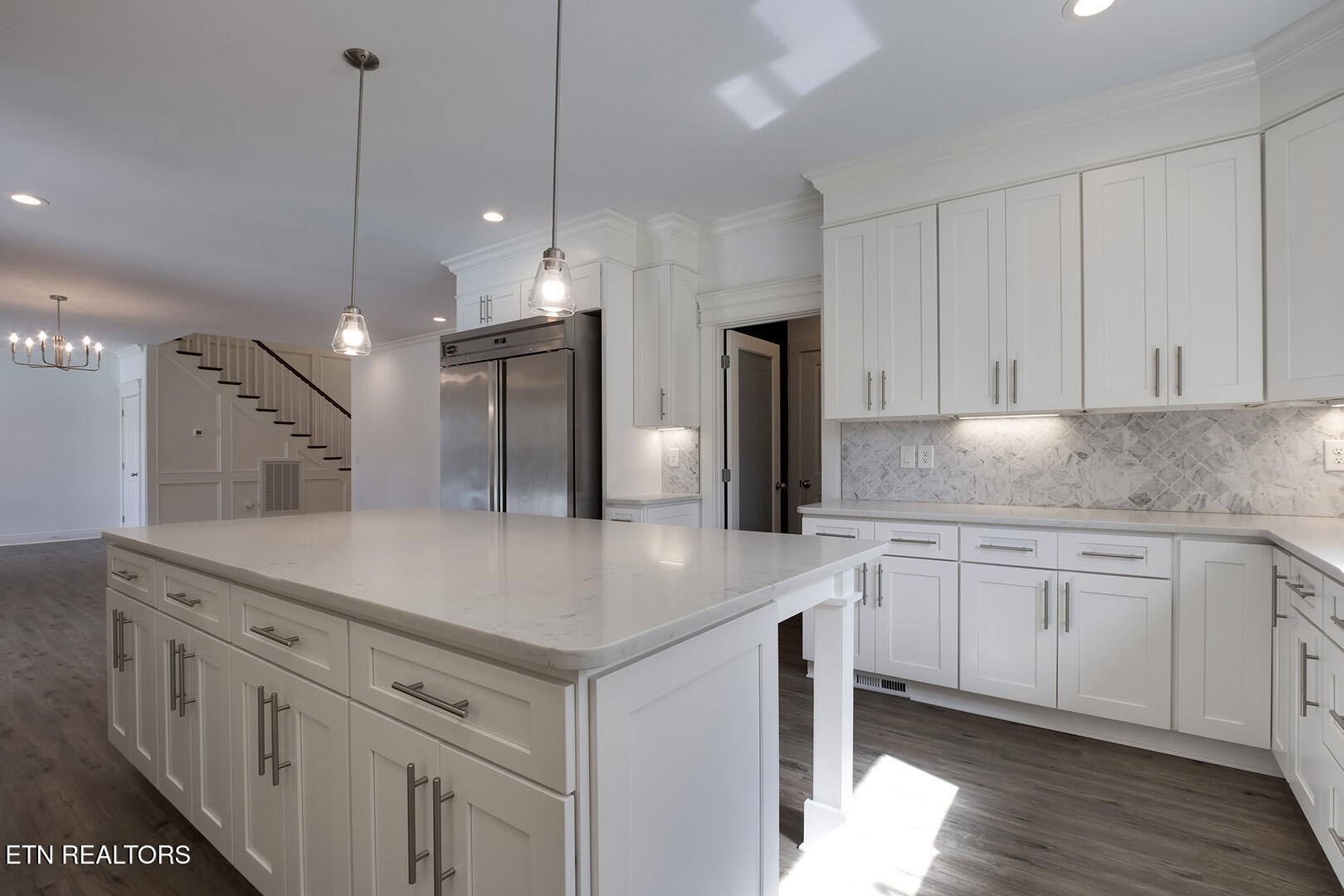 405 Beard Valley Road Maynardville, TN 37807 - Photo 11 of 60 a kitchen with stainless steel appliances granite countertop a sink a stove and a refrigerator