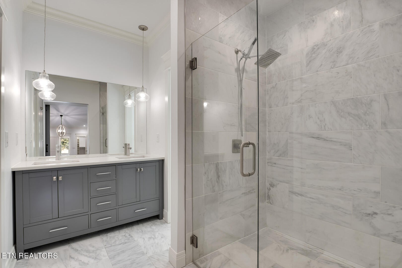 405 Beard Valley Road Maynardville, TN 37807 - Photo 22 of 60 a bathroom with a double vanity sink a mirror and shower