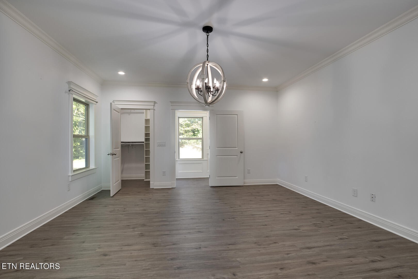 405 Beard Valley Road Maynardville, TN 37807 - Photo 24 of 60 a view of an empty room with window and wooden floor