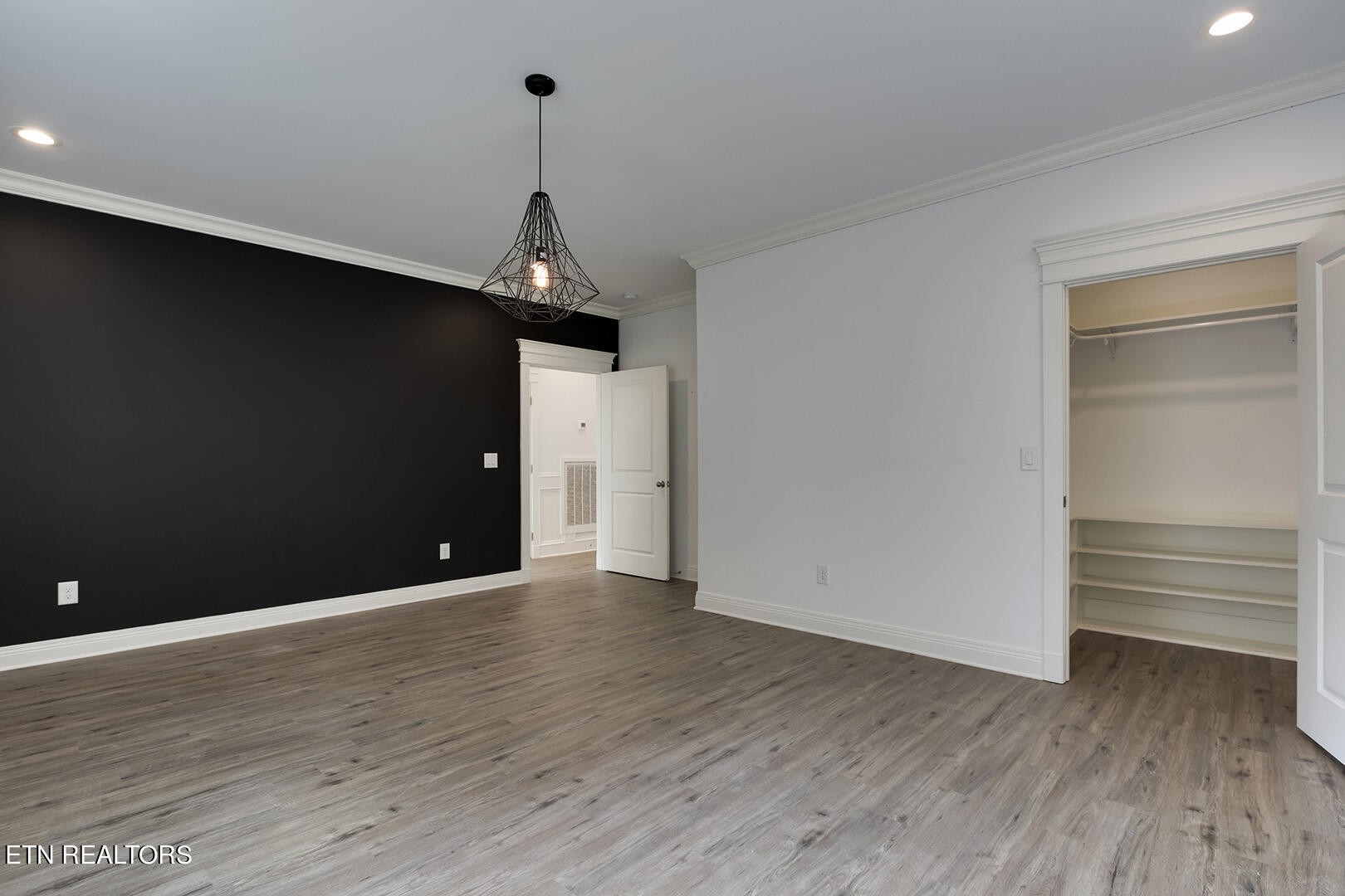 405 Beard Valley Road Maynardville, TN 37807 - Photo 37 of 60 a view of an empty room with wooden floor